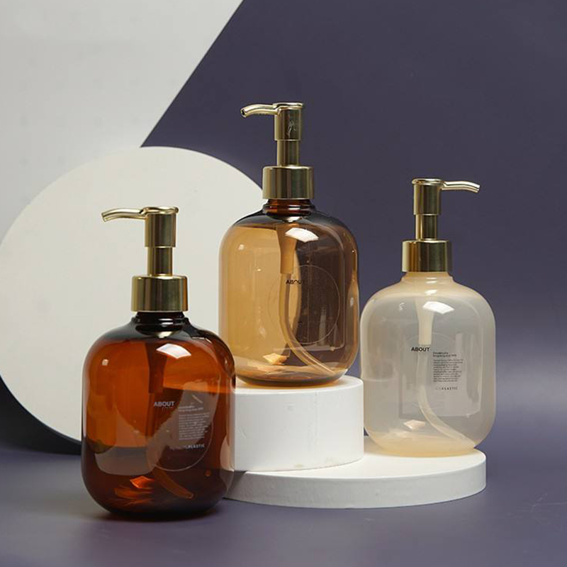 300ml 500ml PET প্লাস্টিক অ্যাম্বার গোলাকার খালি কন্ডিশনার বডি লোশন বোতল গোল্ড PET লোশন পাম্প শ্যাম্পুর বোতল