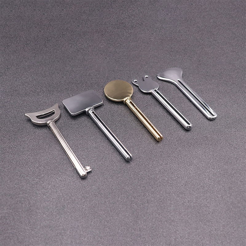 মেটাল টুথপেস্ট ডিসপেনসার ফেসিয়াল ক্লিনজার টুথপেস্ট টিউব স্কুইজার কী শেপ প্রসাধনী টিউব স্কুইজার