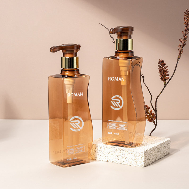 চুলের যত্ন শ্যাম্পু কন্ডিশনার বা ফেস ক্রিম ব্যবহারের জন্য পাম্প সহ নির্ভরযোগ্য 350ml 500ml কার্ভ-আকৃতির অ্যাম্বার পেট প্লাস্টিক খালি বডি লোশন বোতল